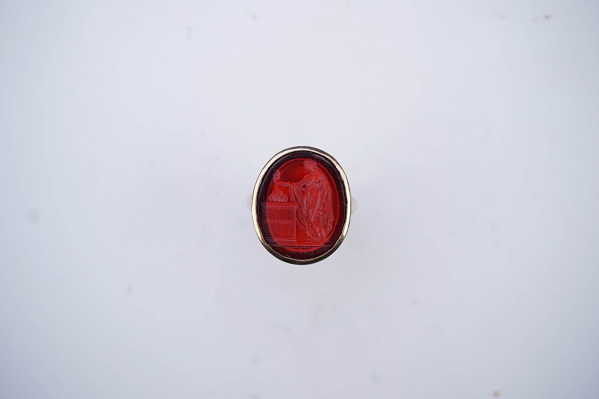 A glass intaglio ring, early 20th century